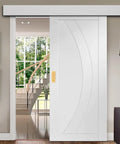 6 Inch Gold Recessed Finger Flush Pulls for Pocket Doors and Closet Doors, installed on white sliding barn door