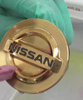 2 Oz Gel 24K Brush Gold Plating Solution For Fast Durable Brilliance on Nissan emblem
