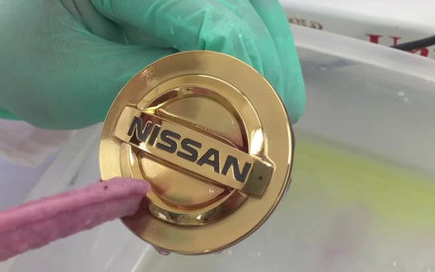 2 Oz Gel 24K Brush Gold Plating Solution For Fast Durable Brilliance on Nissan emblem