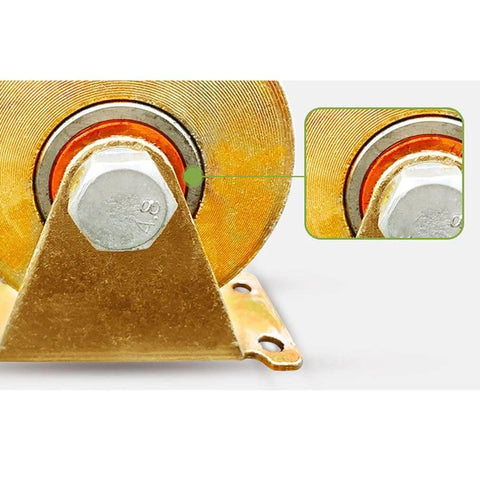 Close-up of gold heavy-duty pulley wheel, 60mm for industrial machines, showing double bearing and sheave directional track roller.