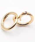 Two gold zinc alloy carabiner clips displayed front-on, part of Twenty Pack Trigger Spring Round Carabiner Clips Snap Hooks For Keyrings Buckles Bags Purses