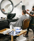 Premium Aluminum Salon Tray With Adjustable Height From 26 To 43 Inches On Wheels, Corrosion Resistant Mobile Tool Tray in use at salon