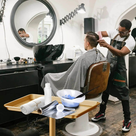 Premium Aluminum Salon Tray With Adjustable Height From 26 To 43 Inches On Wheels, Corrosion Resistant Mobile Tool Tray in use at salon