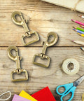 Ten Pack 1 Inch Heavy Duty Swivel Snap Hooks for pet leashes, bags, and harnesses, gold tone, rust resistant, 360 degree rotating