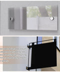 Gold Tone M4x0.7 Sign Standoff Screws With Spacers 8 Pack Wall Mount Hardware for acrylic glass signs and mirrors, installed view.
