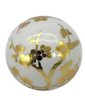 Close-up of 4" Gold & White Floral Chinoiserie Ceramic Ball from 3Pack - Decorative Ball Vase Bowl Filler, showing gold floral design.