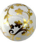 Close-up of a 4" Gold & White Floral Chinoiserie Ceramic Ball from a 3-Pack - Decorative Ball Vase Bowl Filler with floral pattern.
