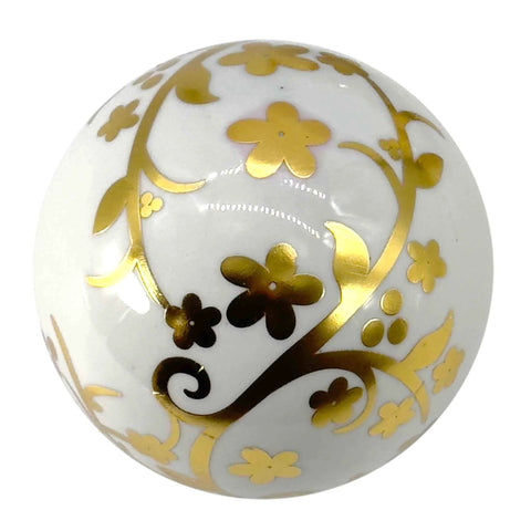 Close-up of a 4" Gold & White Floral Chinoiserie Ceramic Ball from a 3-Pack - Decorative Ball Vase Bowl Filler with floral pattern.