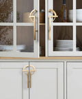 2 Pack Gold Zinc Alloy Cabinet Pulls Modern Minimalist Handle Set installed on gray kitchen cabinets and drawers