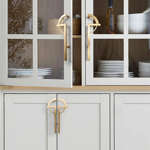 2 Pack Gold Zinc Alloy Cabinet Pulls Modern Minimalist Handle Set installed on gray kitchen cabinets and drawers