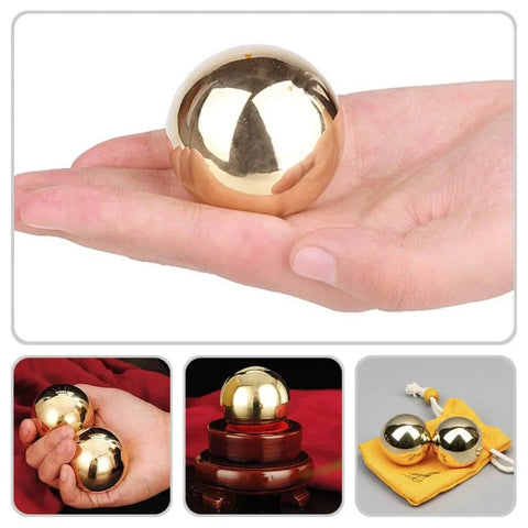 2Pcs Brass Exercise Ball 1.5 Inch Golden Solid Copper Metal Baoding Balls for Hand Therapy Stress Relief, Chinese Kung Fu Massage Acupressure Tool, displayed in hand, showcasing a smooth reflective surface.