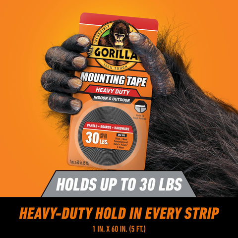 Tough As Nails Industrial Strength Heavy Duty Double Sided Mounting Tape Weatherproof 1 Inch By 60 Inch Black Pack Of 2 Ideal For Indoor Or Outdoor Use That Mounts Up To 30 Pounds For Hanging Clocks Frames Mirrors Shelves And More packaging held by gorilla hand