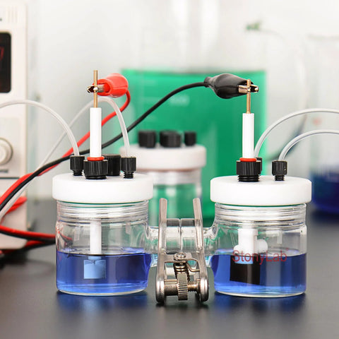 Electrochemical cell setup featuring Ultra Pure Graphite Sheet Electrode 10x10x3 mm with copper core and PTFE coating for lab use.