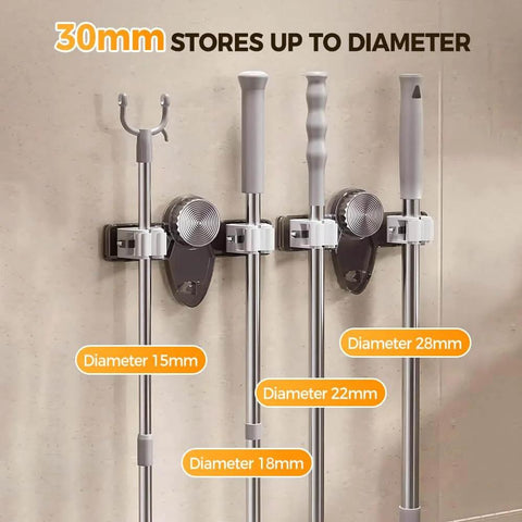 Broom Holder Mop Hanger, 2026 New No punching required Broom Hanger Organizer holding tools, showing various diameter handles.