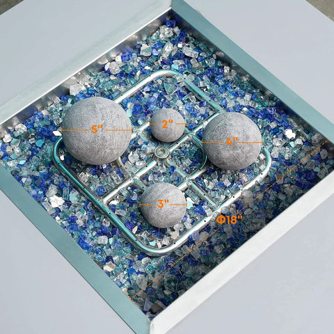 12 Pack Gray Ceramic Balls, Mixed 4 Sizes Fireplace Balls displayed in fire pit with blue glass, highlighting different ball sizes.