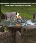 12 Pack Gray Ceramic Balls, Mixed 4 Sizes Fireplace Balls on glass-top table with fire pit, outdoor setup