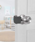 2 Pack Silent Door Latch Covers For Quiet Close Doors installed on interior door, gray neoprene reducing noise in nursery.