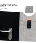 Two door silencers with elastic bands reduce noise and protect doors in nurseries, bedrooms, offices, and libraries; no drilling required, simply suspend on the door knob for damage-free, quiet environments. Shown are installed grey silencers on a door handle.