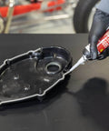 Application of RTV High Performance Silicone Sealant Gray 190 Ml For Flexible Gaskets And High Torque Applications on engine cover