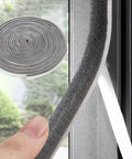 Installing 33 Ft Gray Self-Adhesive Soundproofing Weather Stripping for Doors and Windows, 0.35" Wide x 0.2" Thick on window