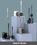 Space Saving Toilet Plunger And Bowl Brush Combo In Gray With Durable Two Compartment Holder displayed on pedestals by MR Siga
