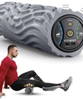 Vibrating Foam Roller For Back Pain Relief With Five Speed Settings Rechargeable Portable Muscle Massage Tool in use on legs