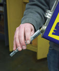 Man holding Grease Joint Rejuvenator Master Kit Large with Pro Model 7862 and Pocket Model 7864, 5-inch flex hose attachment visible