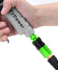 Hand holding a tool with attached Rugged Aluminum Air Coupler And Plug Kit, 15 Piece Pro Grade Set With Quarter Inch NPT Quick Connect Air Fittings.