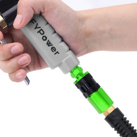 Hand holding a tool with attached Rugged Aluminum Air Coupler And Plug Kit, 15 Piece Pro Grade Set With Quarter Inch NPT Quick Connect Air Fittings.
