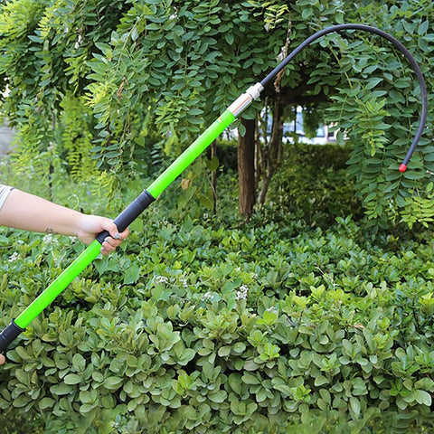 Person holding Insulated High Voltage Rescue Hook With Non Conductive Handle 2m Hot Stick Rescue Tool For Electric Shock Emergencies Heavy Duty U Shaped Hook In Green Ideal For Power Stations Factories Auto Repair And Field Work outdoors.