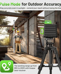 Laser Level 360 Self Leveling With Rechargeable Battery 3x360 Degree Green Laser For Construction And Picture Hanging 3D Layout On Walls Ceilings And Cabinets Magnetic Bracket Hard Case Kit in outdoor use on tripod with worker measuring on construction site.