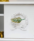 Set Of 2 Metal Green Leaf Cabinet Pulls And Drawer Handles With Simulated Leaf Shape Gradient Color And Glossy Finish installed on cabinet