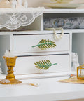 Set Of 2 Metal Green Leaf Cabinet Pulls And Drawer Handles With Simulated Leaf Shape Gradient Color And Glossy Finish, installed on white drawers.