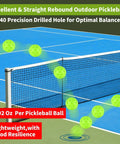 Green 4 pcs Pickleball Balls with 40 Holes on an Indoor/Outdoor Court, showing precision drilled design and lightweight build