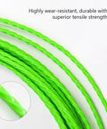 Close-up view of green plastic-coated steel fish tape wire puller, 32 ft length, highlighting durability and tensile strength.