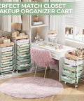 Rolling Storage Utility Cart With Four Drawers For Craft Art Supplies And Makeup Organization On The Go Mobile Cart With Green Finish And Wooden Tabletop Perfect For Kid Rooms Or Office By SYKIARIOL in a room setting next to a white desk and pink chair.