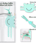 Adjustable Silicone Door Silencer Sleeve Buffer With 5-Position Design, green crab shape, installed on a door latch.