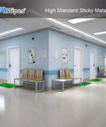 Hospital corridor with green Sticky Mat Adhesive Pads for cleanrooms 24 by 36 inches 5 pack under each door