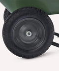 Close-up of inflatable rubber wheel on the 3.7 Cubic Feet Garden Wheelbarrow with 330 Pound Capacity, featuring tread design.