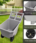 2 Wheel Wheelbarrow 300 LB Capacity Heavy Duty Yard Cart with 9 Inch Solid Tires and Grey Plastic Tub in garden