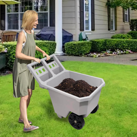 2 Wheel Wheelbarrow 300 LB Capacity Heavy Duty Yard Cart with 9 Inch Solid Tires in use, showing push pull design, grey plastic tub filled with soil