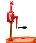 Side view of Groz 44052 Rotary Barrel Pump, 1" Inlet with 3-piece Threaded Suction Tube on orange drum