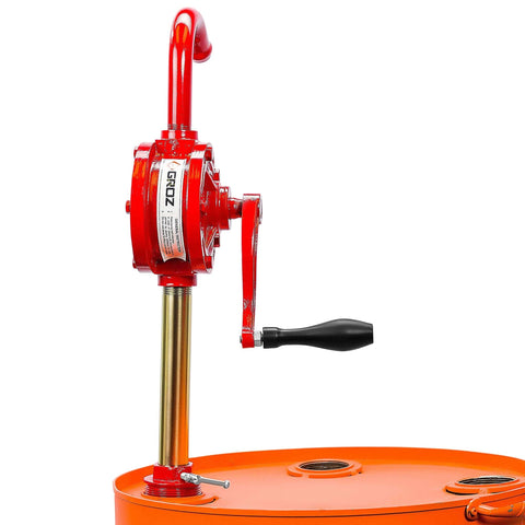 Side view of Groz 44052 Rotary Barrel Pump, 1" Inlet with 3-piece Threaded Suction Tube on orange drum