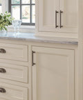 Gunmetal Transitional Cabinet Pull Davenport Style Six And Five Sixteenths Inches Center To Center installed on kitchen cabinet