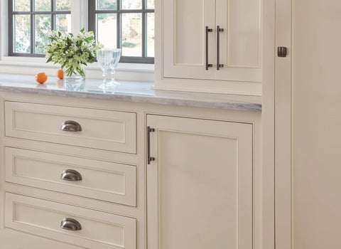 Gunmetal Transitional Cabinet Pull Davenport Style Six And Five Sixteenths Inches Center To Center installed on kitchen cabinet
