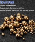 100-Pac Bearing Balls, 6mm Precision H65 Brass Bearing Balls displayed on textured surface for machinery, automotive, and DIY use.
