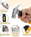 Hand holding 8 ounce hammer with nail puller, non-slip grip, magnetic nail starter, heat-treated alloy, and hanging hole
