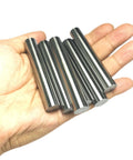 Six Pack One Half Inch Diameter And Three Inch Length Dowel Pins For Solid Wood Projects held in hand