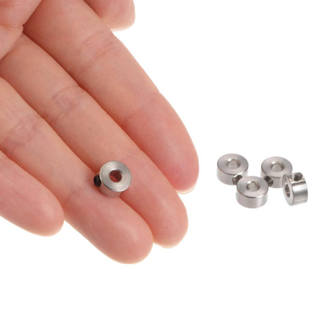 10pcs Set Screw Collars 3.05mm Bore Shaft Collars, 8mm OD, 4mm Width, nickel-plated, shown held between fingers