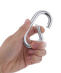 Hand holding a 4 Inch Carabiner Clip Heavy Duty Spring Snap Hook Oval Shape, zinc-galvanized steel, suitable for boating and camping use